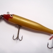 *IVA�KA, druh 2013, 125 mm (d�lka wobbleru s lopatkou), 17 g. Hlavatkov� a �tikov� wobbler jednod�ln�, vybarven� a tvaru �ti�ky, velmi obl�ben� p�i lovu p�erostl�ch dravc�, montovan� s 2 trojh��ky. V�robce ZNAK HK.